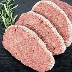 Een rundhamburger met een zachte beet